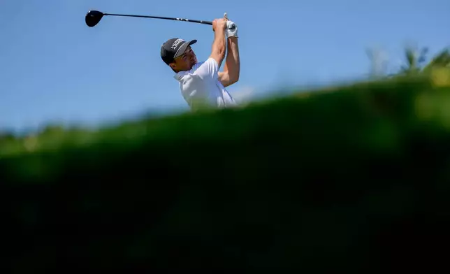 Jordan Spieth hits from the eighth tee during the third round of the Cadillac Championship PGA golf tournament Saturday, May 2, 2026, in Doral, Fla. (AP Photo/David J. Phillip)