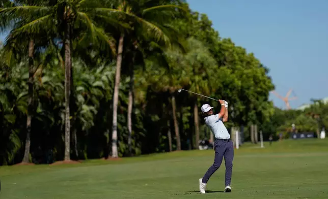 Cameron Young hits from the 14th fairway during the third round of the Cadillac Championship PGA golf tournament Saturday, May 2, 2026, in Doral, Fla. (AP Photo/David J. Phillip)