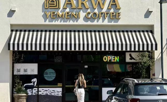 A customer enters Arwa Yemeni Coffee on April 6, 2026, in Sunnyvale, Calif. (AP Photo/Haven Daley)