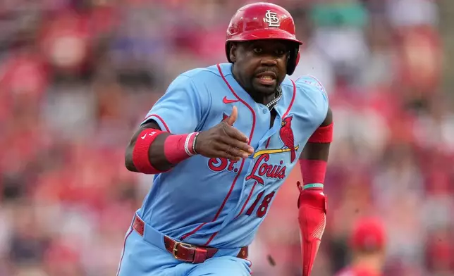 St. Louis Cardinals' Jordan Walker runs to third base during the second inning of the second baseball game of a doubleheader against the Cincinnati Reds in Cincinnati, Saturday, May 23, 2026. (AP Photo/Carolyn Kaster)