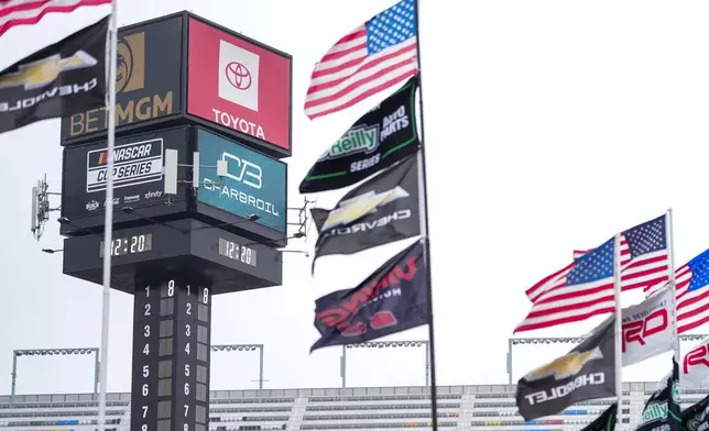 The number '8' is displayed at the top of the scoring tower inside Charlotte Motor Speedway in honor of the late driver Kyle Busch, Friday, May 22, 2026, in Charlotte, N.C. (AP Photo/Matt Kelley)
