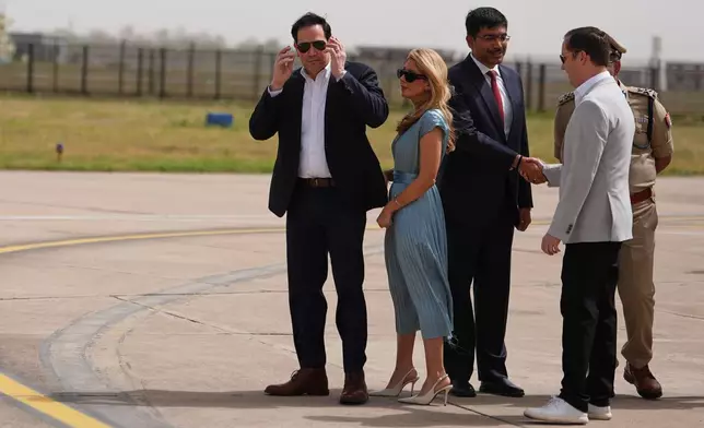United States Secretary of State Marco Rubio waits with his wife Jeanette Rubio after landing in Agra, India, Monday, May 25, 2026. (AP Photo/Julia Demaree Nikhinson, Pool)