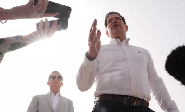 United States Secretary of State Marco Rubio speaks to the journalists before boarding his plane at Indira Gandhi International Airport in New Delhi, India, Monday, May 25, 2026. (AP Photo/Julia Demaree Nikhinson, Pool)
