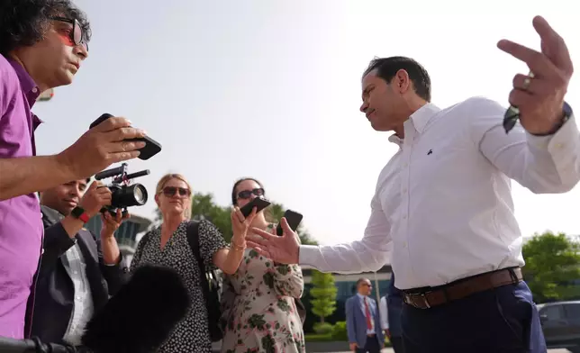 United States Secretary of State Marco Rubio speaks to the journalists before boarding his plane at Indira Gandhi International Airport in New Delhi, India, Monday, May 25, 2026. (AP Photo/Julia Demaree Nikhinson, Pool)