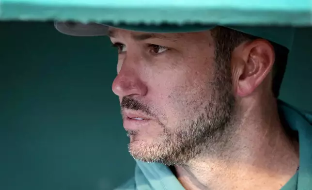 Boston Red Sox interim manager Chad Tracey watches the game from the dugout during the first inning of a baseball game against the Houston Astros, Friday, May 1, 2026, in Boston. (AP Photo/Mark Stockwell)