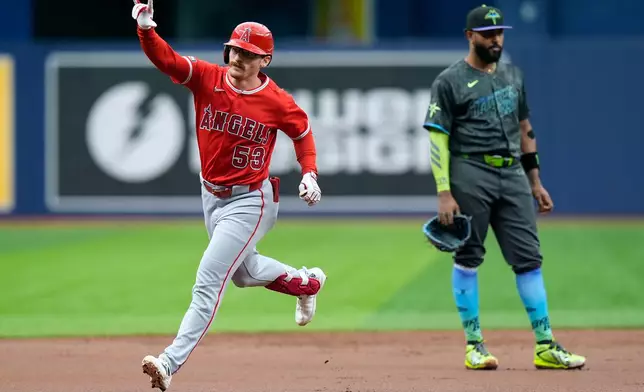 Los Angeles Angels' Wade Meckler (53) reacts after his grand slam off Tampa Bay Rays pitcher Drew Rasmussen during the first inning of a baseball game Saturday, May 30, 2026, in St. Petersburg, Fla. (AP Photo/Chris O'Meara)