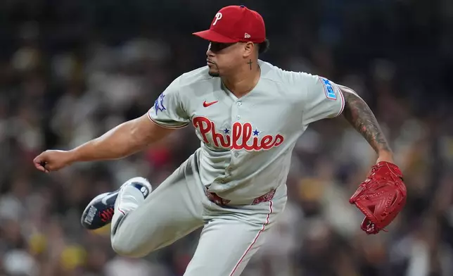Philadelphia Phillies pitcher Jhoan Duran works against a San Diego Padres batter during the ninth inning of a baseball game Tuesday, May 26, 2026, in San Diego. (AP Photo/Gregory Bull)
