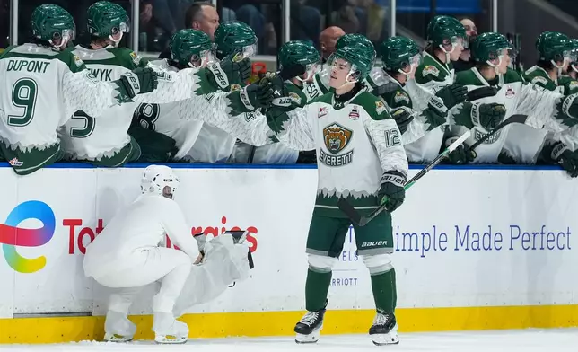 Everett Silvertips' Lukas Kaplan (12) celebrates his goal during the second period of a Memorial Cup hockey game against the Chicoutimi Sagueneens in Kelowna, British Columbia, Saturday, May 23, 2026. (Darryl Dyck/The Canadian Press via AP)