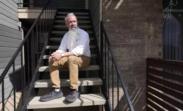 Matthew Haines, owner of the Oakwood Apartments, poses for a photo at the comminty housing location in Arlington, Texas, Tuesday, March 17, 2026. (AP Photo/Tony Gutierrez)