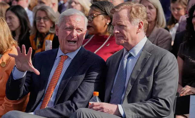Jimmy Haslam, left, one of the principal owners of the Cleveland Browns, talks with NFL Commissioner Roger Goodell , right, before groundbreaking ceremonies for the new Browns stadium in Brook Park, Ohio, Thursday, April 30, 2026. (AP Photo/Sue Ogrocki)