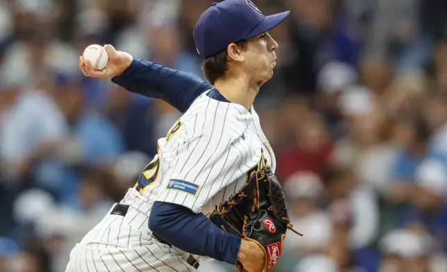 Milwaukee Brewers pitcher Robert Gasser throws to the Los Angeles Dodgers during the first inning of a baseball game Saturday, May 23, 2026, in Milwaukee. (AP Photo/Jeffrey Phelps)
