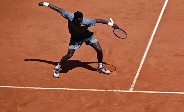 Moise Kouame of France reacts as he plays against Adolfo Daniel Vallejo of Paraguay during their second round men's singles tennis match at the French Open tennis tournament in Paris, Thursday, May 28, 2026. (AP Photo/Emma Da Silva)