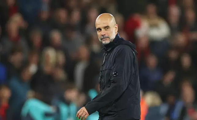 Manchester City's head coach Pep Guardiola leaves the field at the end of the English Premier League soccer match between AFC Bournemouth and Manchester City in Bournemouth, England, Tuesday, May 19, 2026. (AP Photo/Ian Walton)