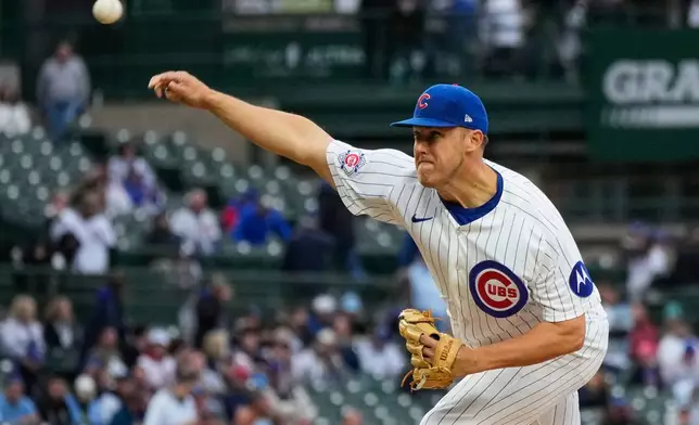 Chicago Cubs starting pitcher Jameson Taillon throws against the Cincinnati Reds during the first inning of a baseball game in Chicago, Tuesday, May 5, 2026. (AP Photo/Nam Y. Huh)