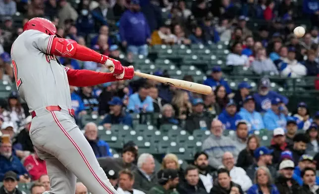 Cincinnati Reds' JJ Bleday hits a solo home run during the first inning of a baseball game against the Chicago Cubs in Chicago, Tuesday, May 5, 2026. (AP Photo/Nam Y. Huh)