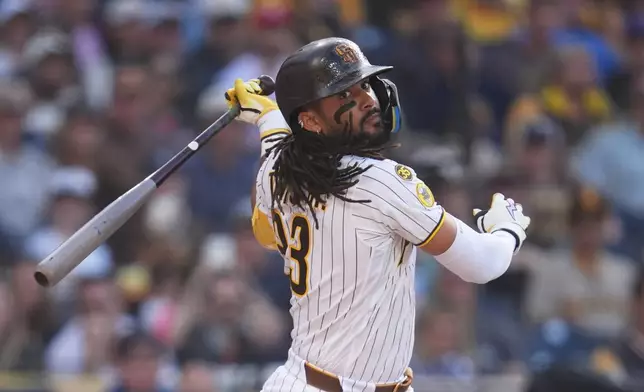 San Diego Padres' Fernando Tatis Jr. watches a foul ball while batting during the fourth inning of a baseball game against the St. Louis Cardinals Saturday, May 9, 2026, in San Diego. (AP Photo/Gregory Bull)
