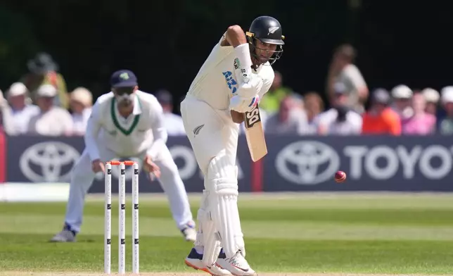 New Zealand's Rachin Ravindra in action on day one of the International Test Match between Ireland and New Zealand, in Belfast, Ireland, Wednesday May 27, 2026. (Niall Carson/PA via AP)
