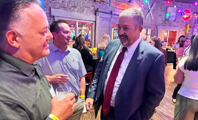 Bernalillo County District Attorney Sam Bregman, one of two Democratic candidates for New Mexico governor, campaigns at Quezada's Comedy Club at Santa Ana Pueblo, N.M. on April 28, 2026, ahead of a June 2 primary election. (AP Photo/Morgan Lee)