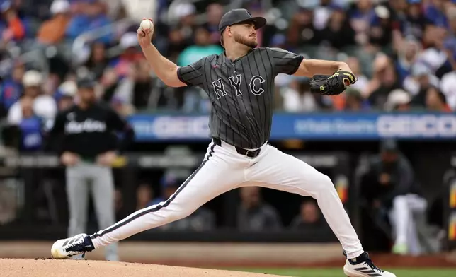 New York Mets pitcher Christian Scott throws during the first inning of a baseball game against the Miami Marlins, Saturday, May 30, 2026, in New York. (AP Photo/Adam Hunger)