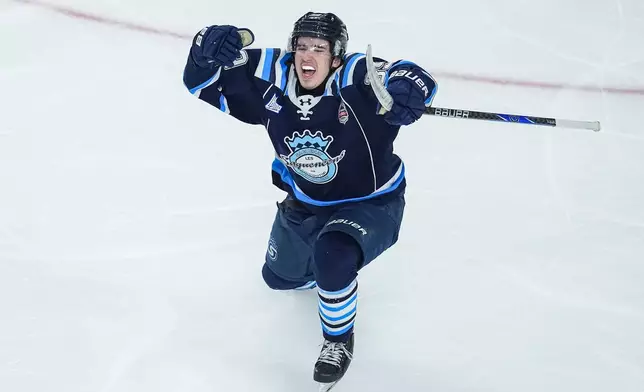 Chicoutimi Sagueneens' Liam Lefebvre (39) celebrates his winning goal during the first overtime period of a Memorial Cup hockey game against the Kelowna Rockets in Kelowna, British Columbia, Sunday, May 24, 2026. (Darryl Dyck/The Canadian Press via AP)