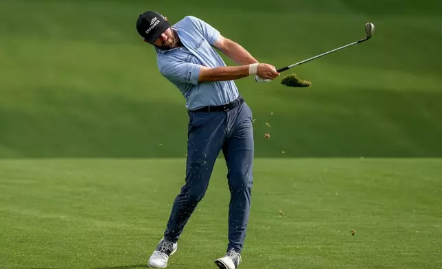 Cameron Young hits from the 14th fairway during third round of the Truist Championship golf tournament at the Quail Hollow Club, Saturday, May 9, 2026, in Charlotte, N.C. (AP Photo/Chris Carlson)