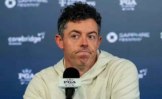Rory McIlroy, of Northern Ireland, speaks to the media prior to a PGA Championship golf tournament practice round at Aronimink Golf Club, Tuesday, May 12, 2026, in Newtown Square, PA. (AP Photo/Carolyn Kaster)