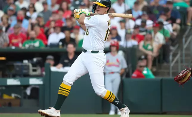 Athletics' Nick Kurtz hits an RBI single during the second inning of a baseball game against the St. Louis Cardinals Tuesday, May 12, 2026, in West Sacramento, Calif. (AP Photo/Scott Marshall)