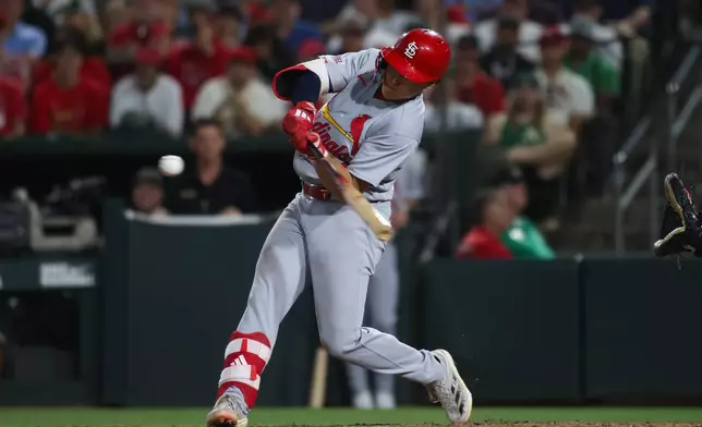 St. Louis Cardinals' JJ Wetherholt hits a two run home run during the sixth inning of a baseball game against the Athletics Tuesday, May 12, 2026, in West Sacramento, Calif. (AP Photo/Scott Marshall)