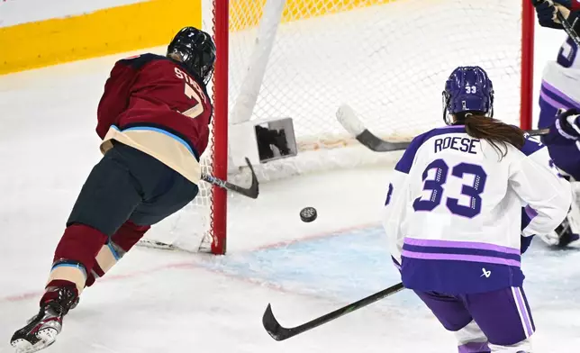 Montreal Victoire's Laura Stacey (7) scores her third goal against the Minnesota Frost during the third period of a PWHL playoff hockey game in Laval, Quebec Saturday, May 2, 2026. (Graham Hughes/The Canadian Press via AP)