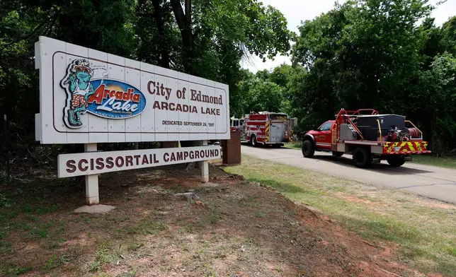 Edmond fire crews enter Scissortail Campground at Arcadia Lake in Edmond, Okla. on Monday, May 4, 2026 after a party shooting on Sunday evening. (AP Photo/Alonzo Adams)
