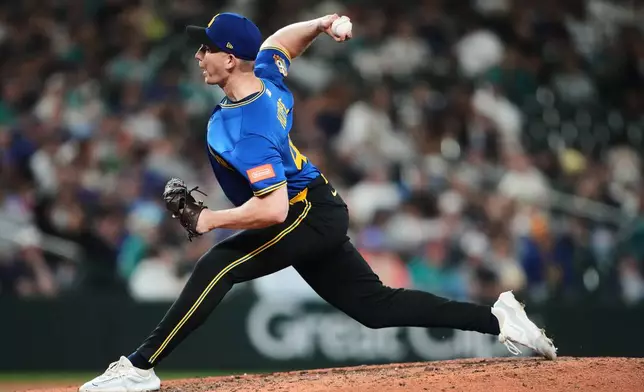 Seattle Mariners relief pitcher Alex Hoppe throws against the Kansas City Royals during the ninth inning of a baseball game, Friday, May 1, 2026, in Seattle. (AP Photo/Lindsey Wasson)