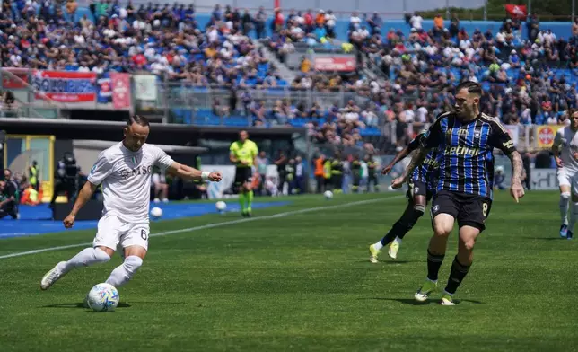 Napoli's Stanislav Lobotka drives the ball during the Serie A soccer match between Pisa and Napoli in Pisa, Italy, Sunday May 17 2026. (Alessandro La Rocca/LaPresse via AP)