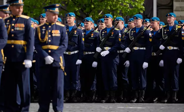 Russian servicemen stand in a formation before the Victory Day military parade in Moscow, Saturday, May 9, 2026, during celebrations of the 81st anniversary of the Soviet Union's victory over Nazi Germany during the World War II. (AP Photo/Pavel Bednyakov, Pool)