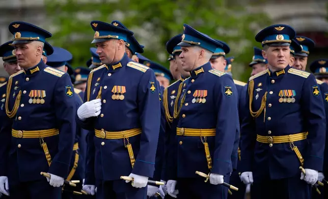 Russian servicemen stand in a formation before the Victory Day military parade in Moscow, Saturday, May 9, 2026, during celebrations of the 81st anniversary of the Soviet Union's victory over Nazi Germany during the World War II. (AP Photo/Pavel Bednyakov, Pool)