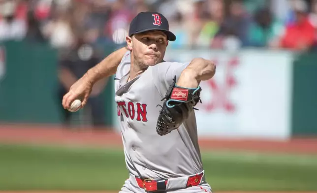Boston Red Sox starting pitcher Sonny Gray delivers against the Cleveland Guardians during the first inning of a baseball game, Saturday, May 30, 2026, in Cleveland. (AP Photo/Phil Long)
