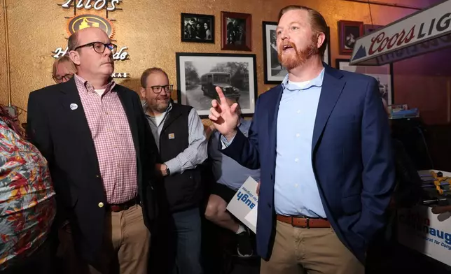State Sen. John Cavanaugh, candidate for the Democratic nomination to the House of Representatives in Nebraska's second district, speaks during an election night watch party Tuesday, May 12, 2026, in Omaha, Neb. (AP Photo/Rebecca S. Gratz)