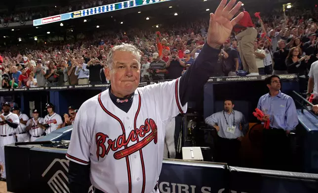 FILE - Atlanta Braves manager Bobby Cox waves to fans after a loss to the San Francisco Giants in Game 4 of baseball's National League Division Series in Atlanta, Oct. 11, 2010. (AP Photo/Dave Martin, File)