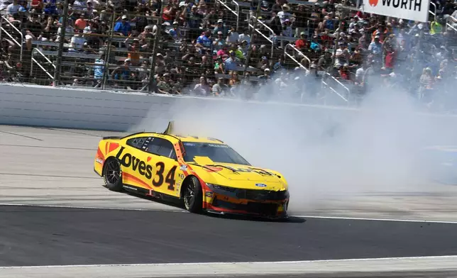Todd Gilliland (34) loses control during a NASCAR Cup Series auto race at Texas Motor Speedway in Fort Worth, Texas, Sunday, May 3, 2026. (AP Photo/Randy Holt)