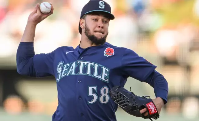 Seattle Mariners pitcher Luis Castillo throws during the first inning of a baseball game against the Athletics in West Sacramento, Calif., Monday, May 25, 2026. (AP Photo/Nic Coury)