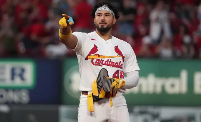 St. Louis Cardinals designated hitter Ivan Herrera celebrates after hitting a three-run double during the fourth inning of a baseball game against Milwaukee Brewers Monday, May 4, 2026, in St. Louis. (AP Photo/Jeff Roberson)