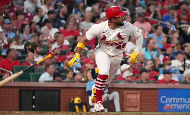 St. Louis Cardinals designated hitter Ivan Herrera watches his three-run double during the fourth inning of a baseball game against Milwaukee Brewers Monday, May 4, 2026, in St. Louis. (AP Photo/Jeff Roberson)