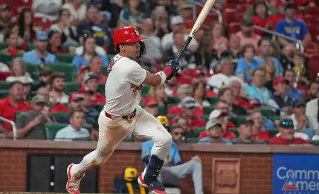 St. Louis Cardinals' Masyn Winn follows through on an RBI single during the seventh inning of a baseball game against Milwaukee Brewers Monday, May 4, 2026, in St. Louis. (AP Photo/Jeff Roberson)
