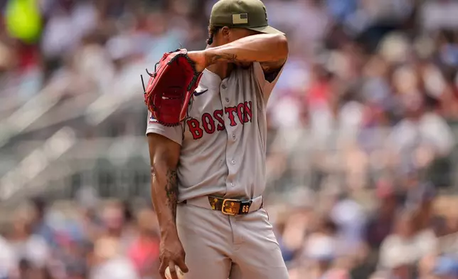 Boston Red Sox pitcher Brayan Bello (66) works in the fifth inning of a baseball game against the Atlanta Braves, Sunday, May 17, 2026, in Atlanta. (AP Photo/Mike Stewart)
