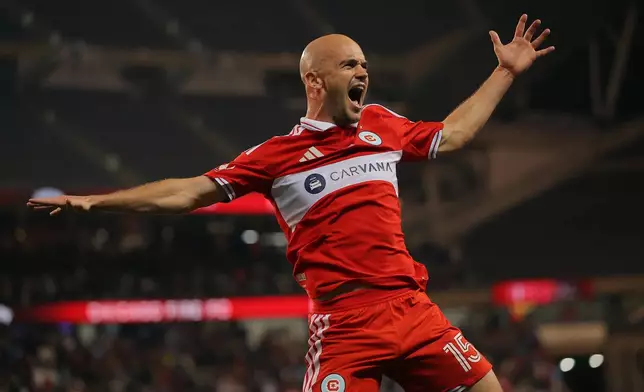 Chicago Fire defender Andrew Gutman (15) celebrates after scoring during the second half of an MLS soccer match against Toronto FC, Saturday, May 23, 2026, in Chicago. (AP Photo/Melissa Tamez)