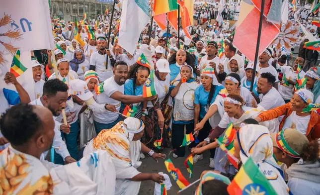 Supporters of Ethiopia's ruling Prosperity Party cheer at a rally ahead of the national elections in Addis Ababa, Ethiopia, Tuesday, May 26, 2026. (AP Photo/Amanuel Sileshi)