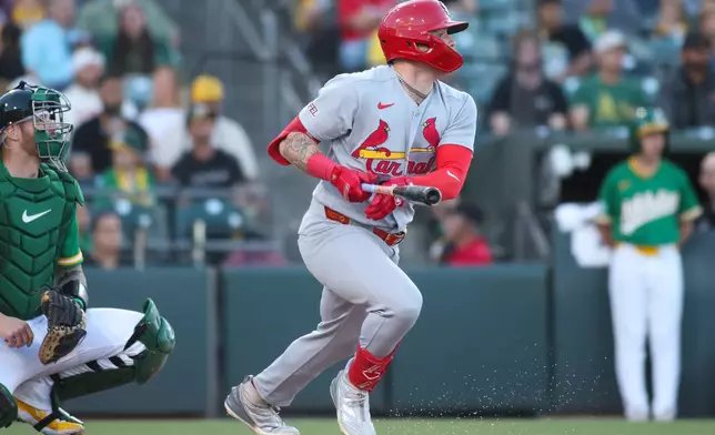 St. Louis Cardinals' Nathan Church hits an rbi single during the fourth inning of a baseball game against the Athletics Wednesday, May 13, 2026, in West Sacramento, Calif. (AP Photo/Scott Marshall)