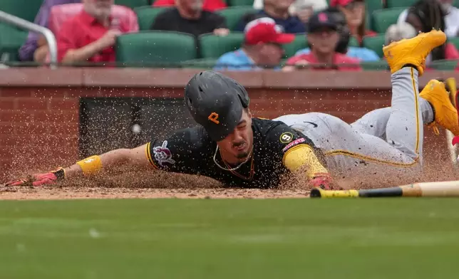 Pittsburgh Pirates' Konnor Griffin scores during the sixth inning of a baseball game against St. Louis Cardinals Thursday, May 21, 2026, in St. Louis. (AP Photo/Jeff Roberson)