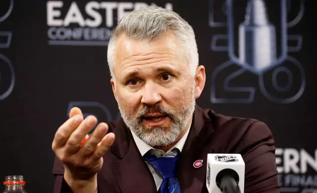 Montréal Canadiens head coach Martin St. Louis speaks to the media following Game 1 of the Eastern Conference finals NHL hockey Stanley Cup playoffs series between the Carolina Hurricanes and the Montréal Canadiens in Raleigh, N.C., Thursday, May 21, 2026. (AP Photo/Karl DeBlaker)