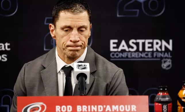Carolina Hurricanes head coach Rod Brind'Amour speaks to the media following Game 1 of the Eastern Conference finals NHL hockey Stanley Cup playoffs series between the Carolina Hurricanes and the Montréal Canadiens in Raleigh, N.C., Thursday, May 21, 2026. (AP Photo/Karl DeBlaker)