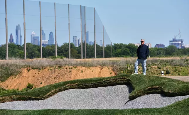 Cobbs Creek Foundation COO Enrique Hervada poses for a photograph at the Cobbs Creek Golf Club during construction in Philadelphia, Tuesday, May 12, 2026. (AP Photo/Matt Rourke)